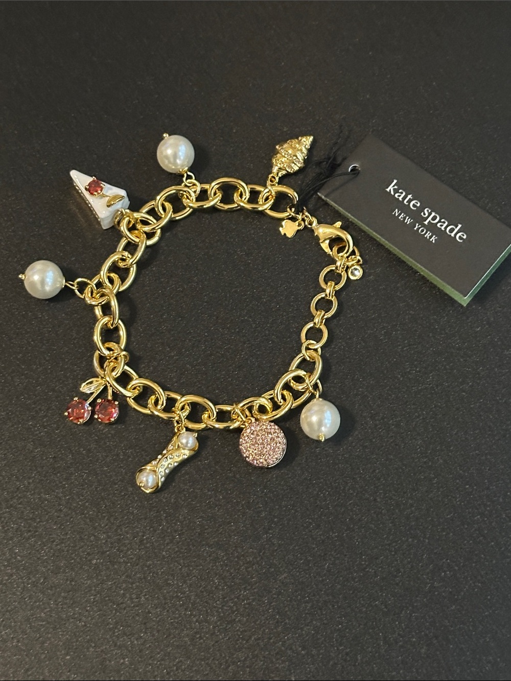 Kate Spade New York Gold-Tone Charm Bracelet with Faux Pearls & Whimsical Charms - Picture 2 of 3